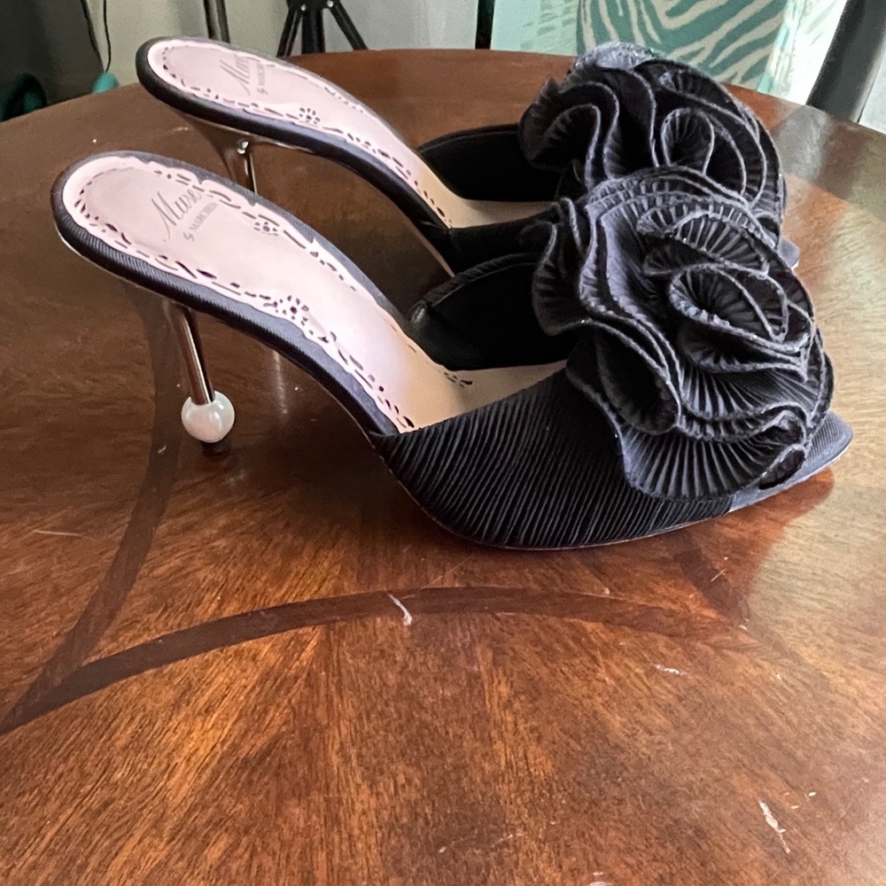Muse by Marchesa Gabriella 
Muse Black Heels with Ruffle details